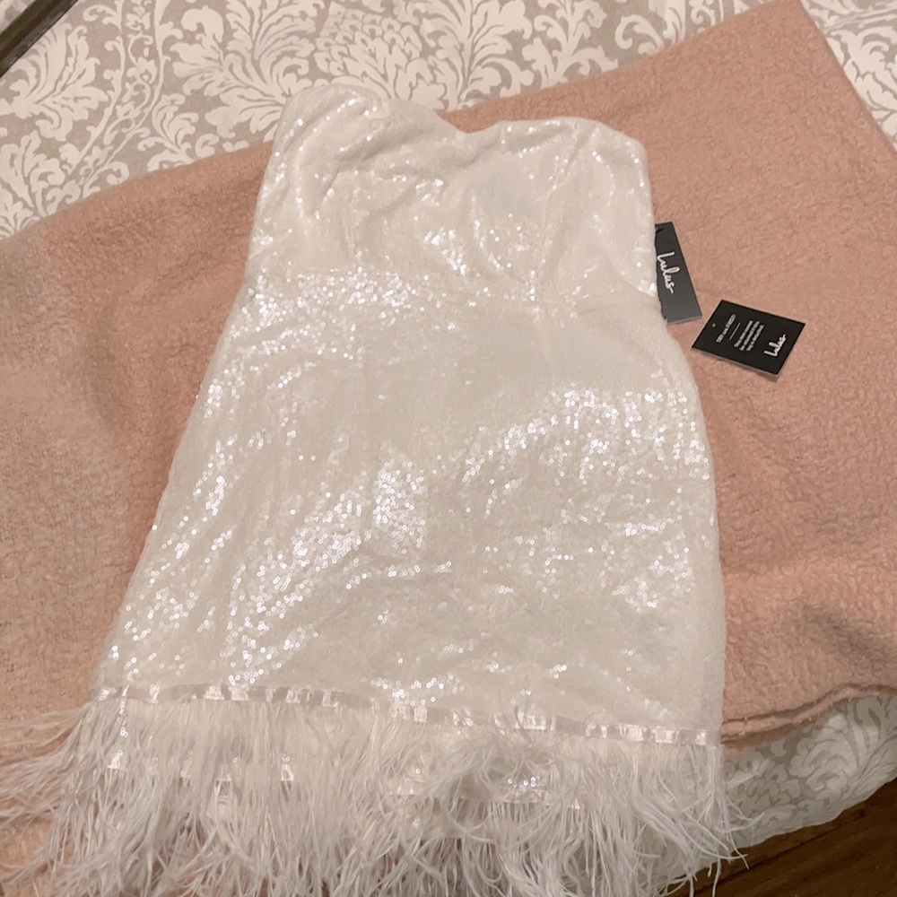 White sequins dress feather bottom & strapless !